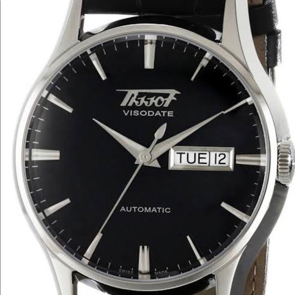 Men’s Tissot real leather watch.